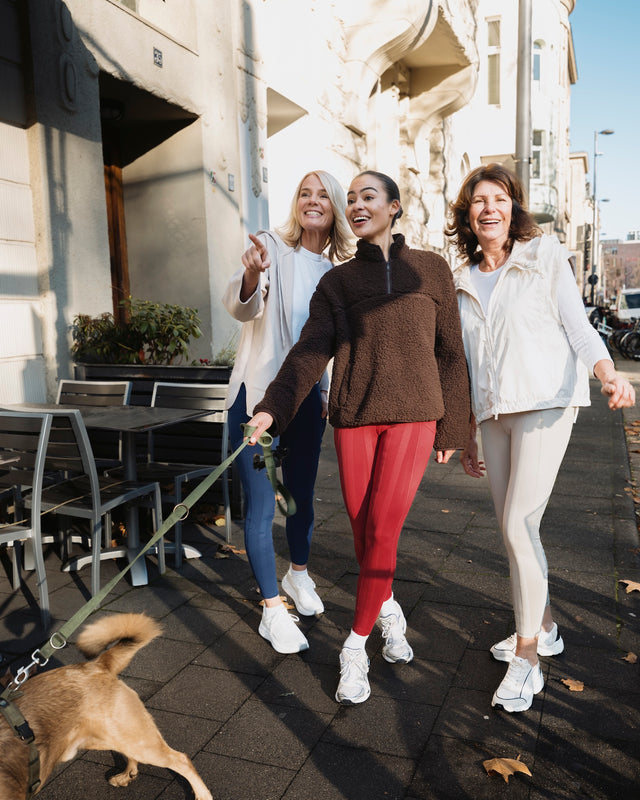 Woman walking dog