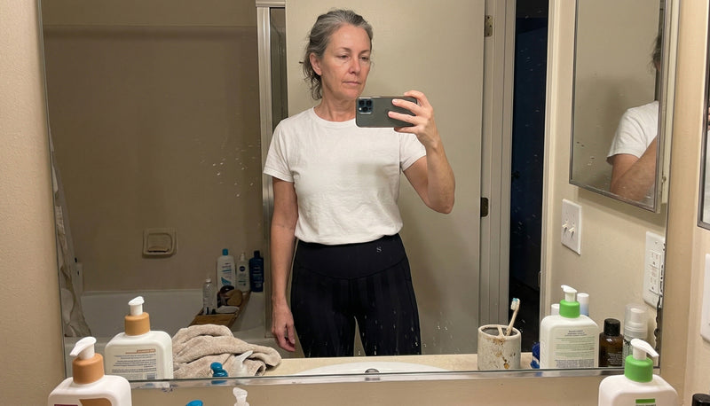 Woman trying on jeans